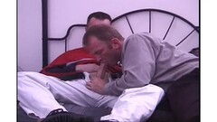 Two hard guys in action in bed Thumb