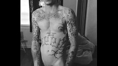 Sexy Tattooed man masturbating Thumb