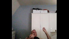 Cliff Bullivant on his bed with pop Thumb