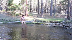 Bathing naked in the creek. Thumb