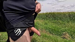 I masturbate my penis while walking in shorts in public. Thumb