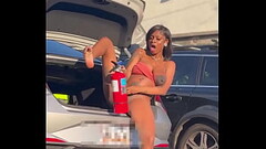 Ebony woman and fire extinguisher Thumb